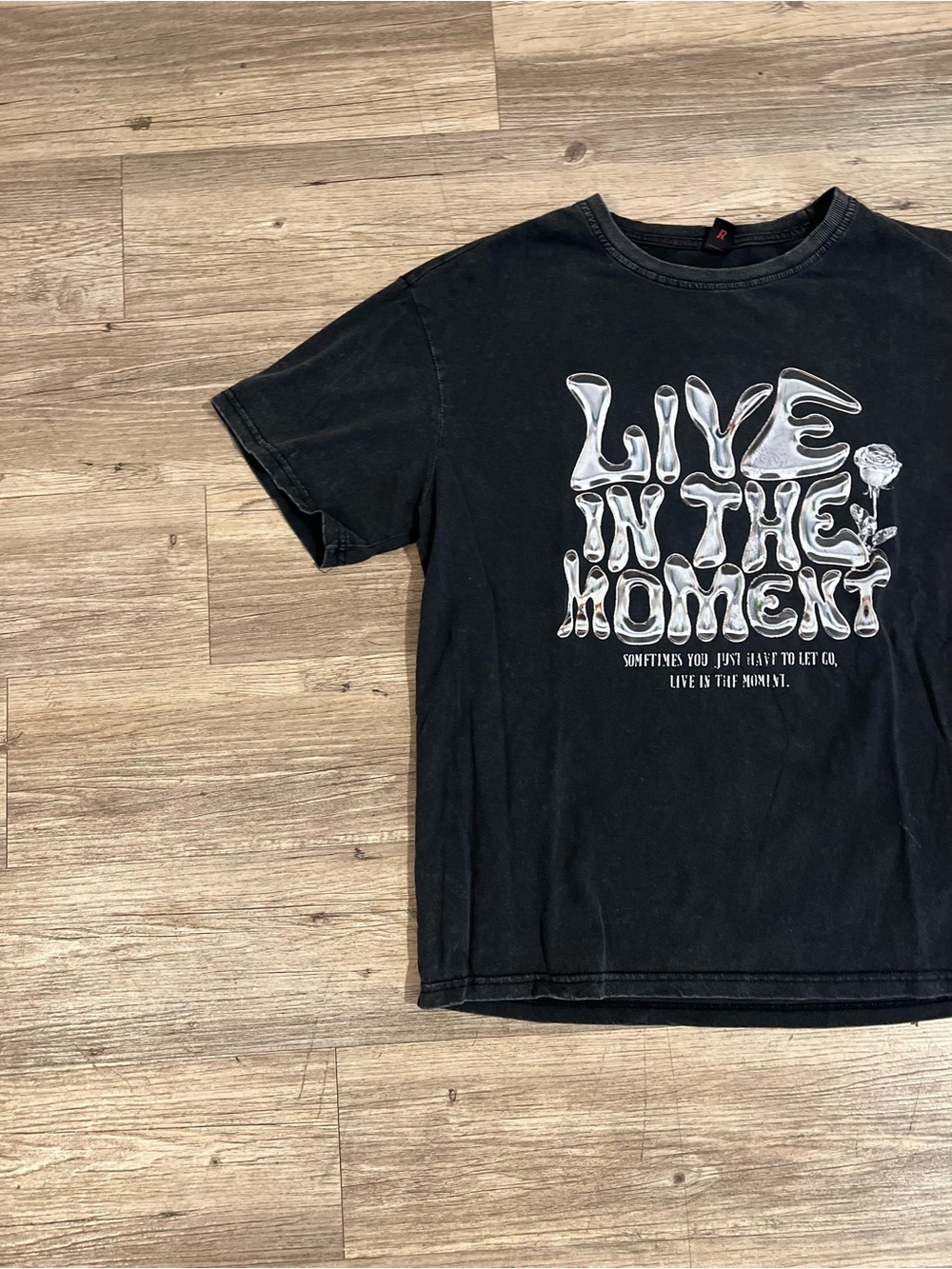Live in the Moment" graphic tee with white text and rose graphic Size Medium